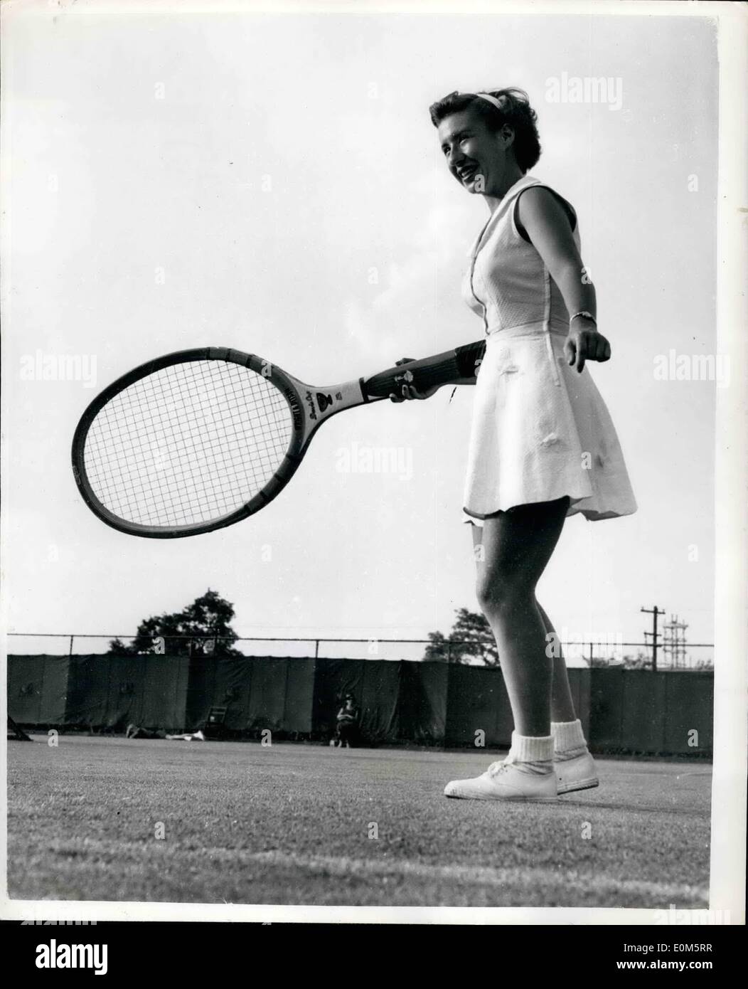 Sep. 03, 1953 - 3.9.53 Little Mo but a big racquet. Miss Maureen Connolly, Little Mo, the American tennis champion caused a spot of fun when she appeared on the court with a giant tennis racquet, at the West Side Tennis Club, Forest Hills, New York, where the American National Tennis Championships are being held. Stock Photo