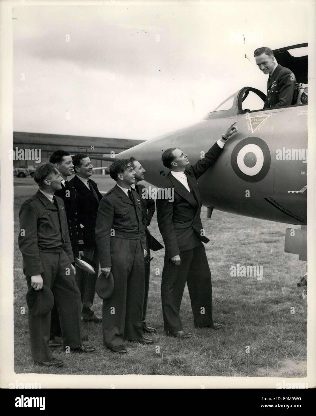 Sep. 09, 1953 - Society of British Aircraft Constructors? Show at Farnborough. Photo Shows: Seated in the cockpit of an Avro-Delta is Sq. Ldr. H.T. Murley, D.F.C., A.F.C. chatting to co-pilots of the Avro-Delta team. They are (L to R) Sq. Ldr. W. Noble, D.S.C., R.N., Mr. J.B. Wales, O.B.E., D.F.C., Ft/Lt. J.E. Burton, Sq. Ldr. W.J. Potocki, D.F.C., and Mr. R.J. Falk, O.B.E., A.F.C. Stock Photo