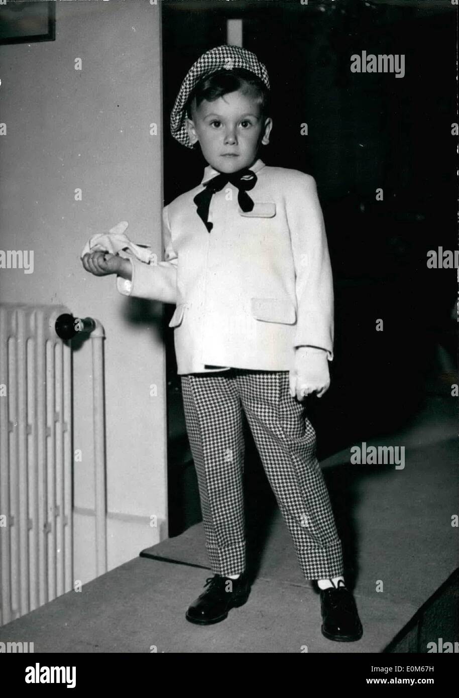 Sep. 09, 1953 - Paris' Latest Fashion For our Children: ''Enfantillage'' has presented her latest models (Autumn - Winter 1953-1954) for Children. Checked Trousers Black and White, Jacket in Lemon Coloured Suedine with a Black Velvet Bow, To-a - shanter Checked black and white. Stock Photo