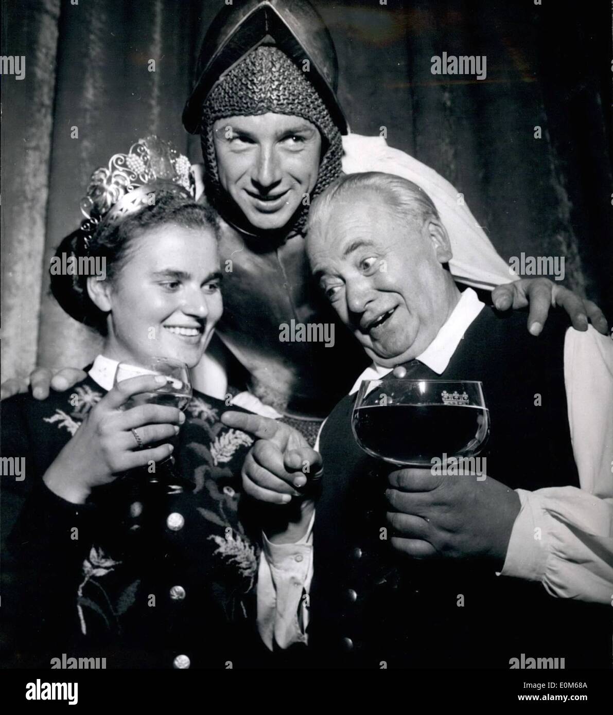 Sep. 09, 1953 - The first German 'Miss Wine' of this year: had been chosen at the 'wine-metropole' of Mainz. The 22 years old Erika Hofmann from St. Johann will now rule as 'Queen' over Rhein- Hessische region of Viticulture. After her coronation the black curly vine-dresser had been introduced by the bulter and her 'Post of honour' to handle the heavy 'Pokaen' (goblets) Stock Photo