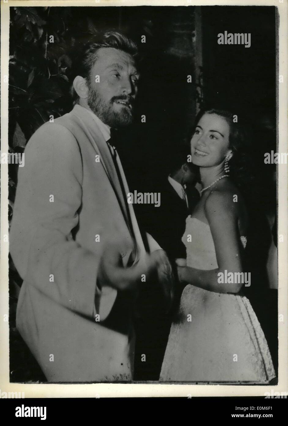 Sep. 09, 1953 - Film stars in Venice: Photo shows Hollywood film star, Kirk Douglas, was wearing a beard when he attended a reception a Volpi House, Venice, with Annamaria Ferrero. He is in Venice for the Film Festival. Stock Photo