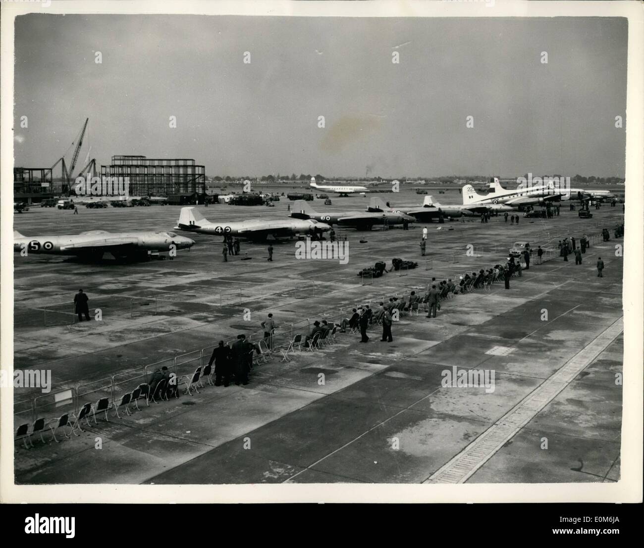 Oct. 10, 1953 - Duke Of Gloucester Starts The Air Race: The Duke of Gloucester dropped a green flag at London Airport this afternoon, and the 12,000-mile air race to New Zealand began. Altogether eight planes are competing. The five machines in the high-speed section are all Canberra jet bombers, three piloted by R.A.F. crews, and two flown by members of the Royal Australian Air Force. But the three planes in the transport section - a B.E.A. Viscount, a K.L.M. Liftmaster and a Royal New Zealand Air Force Hastings, took off first. On board the K.L.M Stock Photo