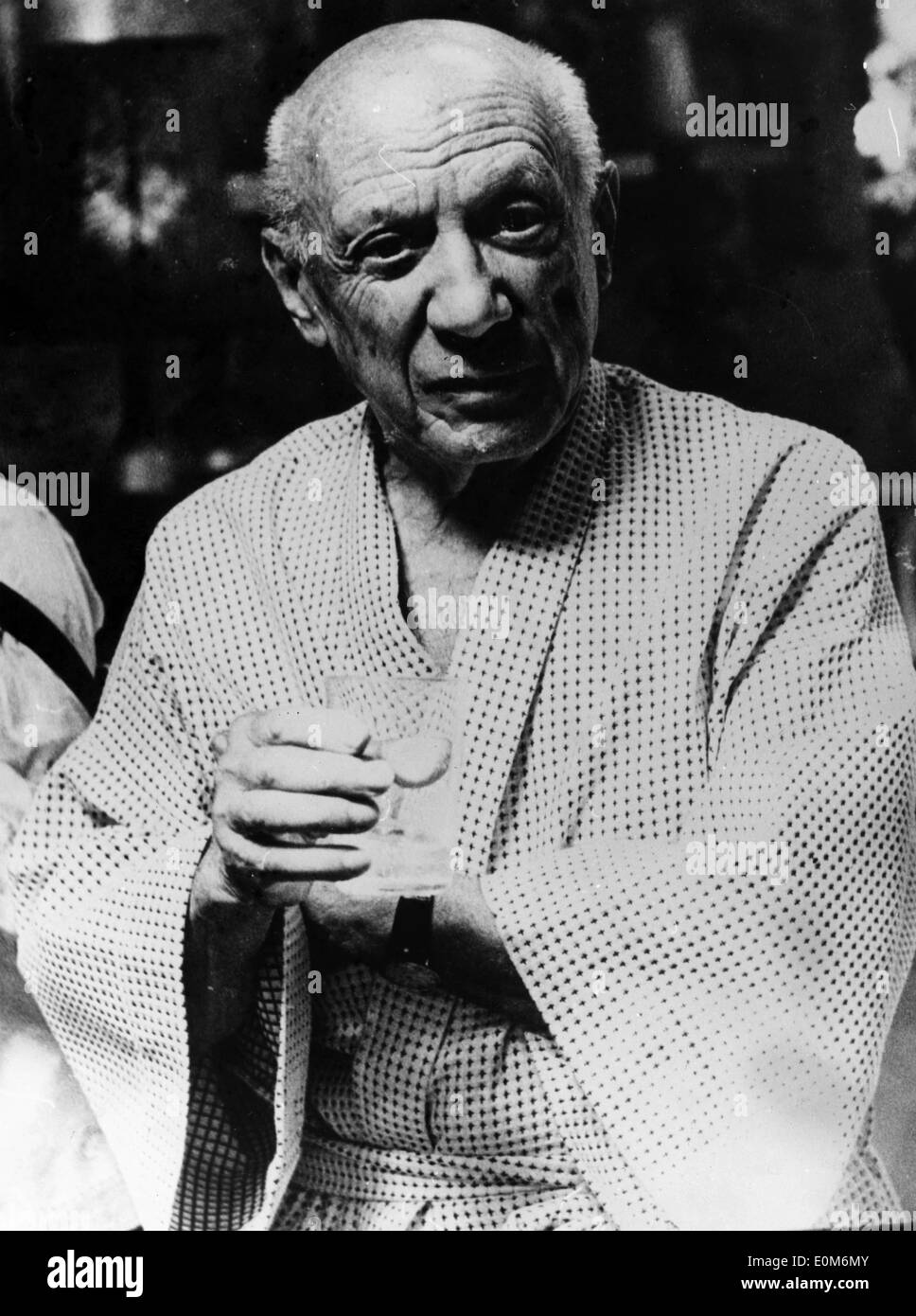 Artist Pablo Picasso wearing a robe Stock Photo