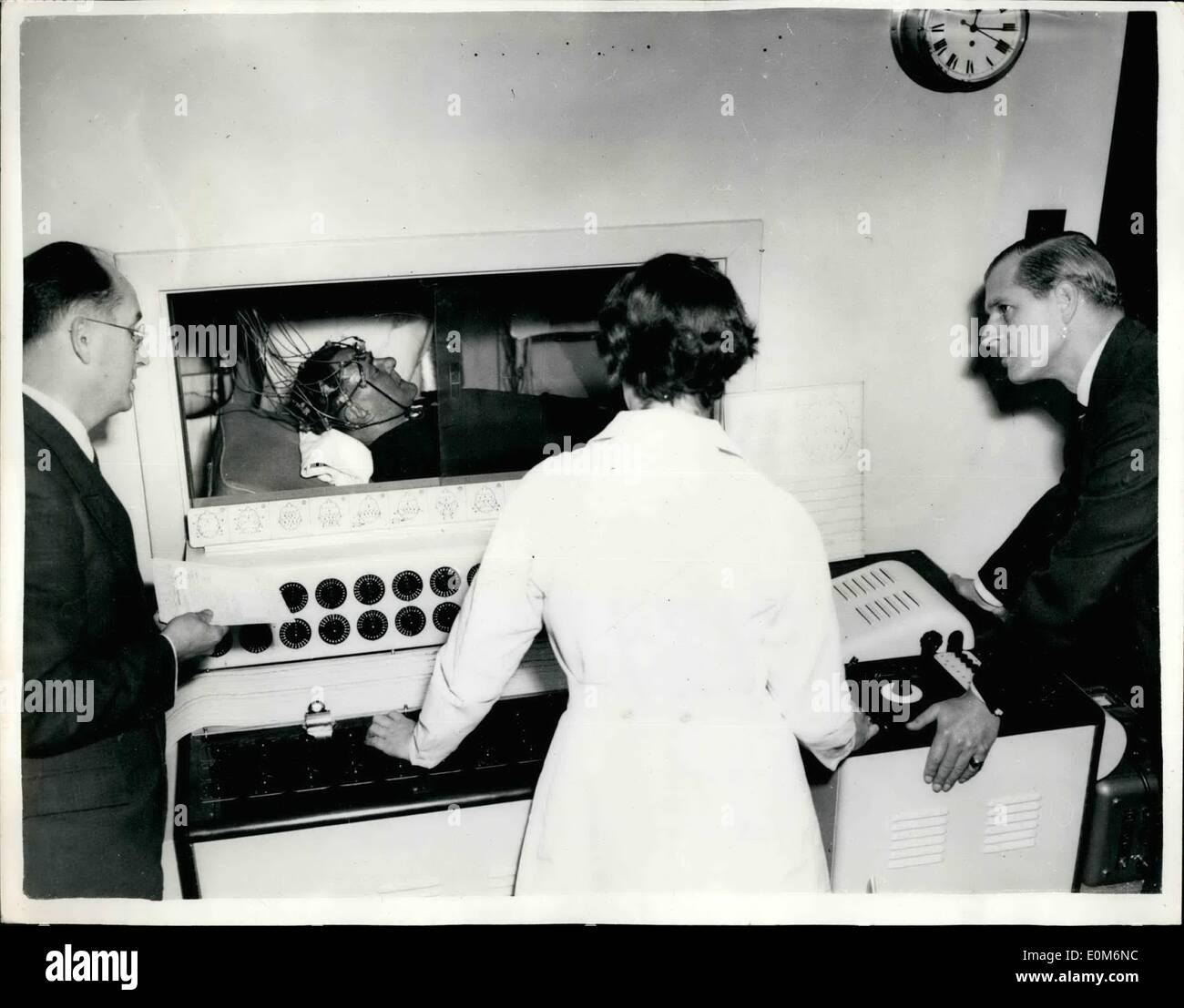 Oct. 28, 1953 - The Duke Of Edinburgh Visits Mental Hospital: When H.R.H. The Duke of Edinburgh visited the Goodmayes Mental Hospital at lford, Essex, this morning - he inspected the E.E.G. Machine the Ediwan 8-Channel Electra-Encephalograph (Mark II) and electronic apparatus for recording the Electrical activity of the human brain. Stock Photo