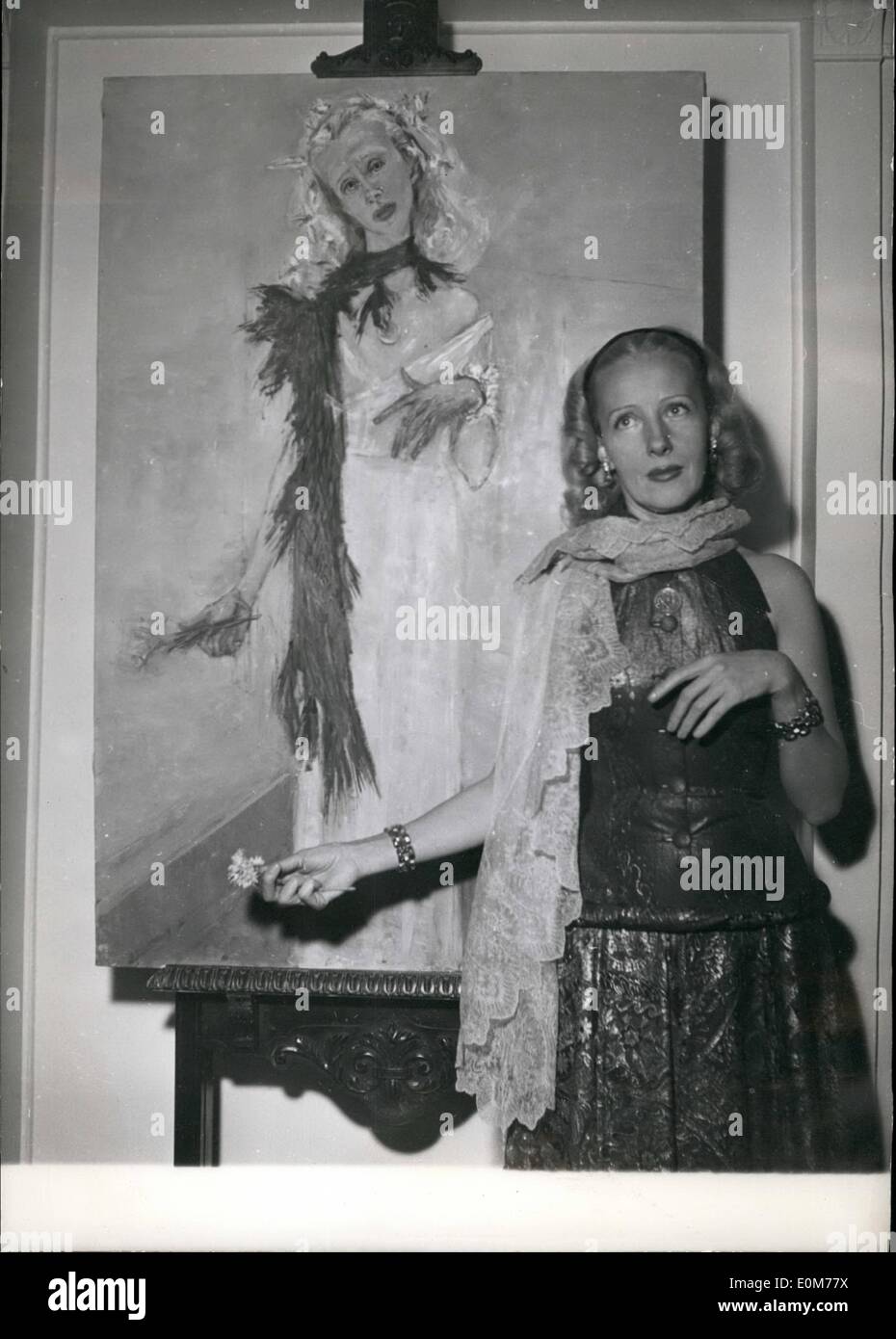Nov. 11, 1953 - Gabriel Marcel's Latest Play Shortly At The Vieux Colombier: The Theatre Of The Vieux Colombier In Paris Will Present Shortly ''Le Chemin Des Cretes'' The Latest Play Written By Gabriel Marcel. Madeleine Ozeray Who Plays The Main Part Is Seen Here Photographed Next To Her Portrait Painted By Framcoise Adnte Who Has Decorated ''Le Chemin Des Cretes' Stock Photo
