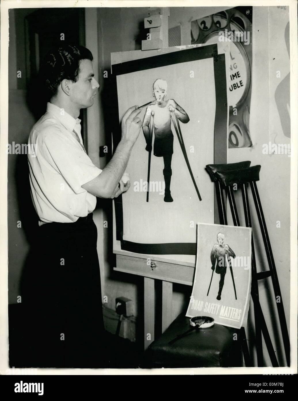 Oct. 10, 1953 - Artists Works On ''Horror Posters''. Hopes It Will Help Road Safety: Maurice Rickards - 33 year old Poster designer is at work on a porter that it is hoped will ''Shock Britain''. It is a poster of a limbless boy - and has been commissioned by the Royal Society for the Prevention of Accidents - and will be displayed in all parts of the country as part of the Society's battle against road accidents. It is thought that posters of this kind will help to create a greater road safety Stock Photo