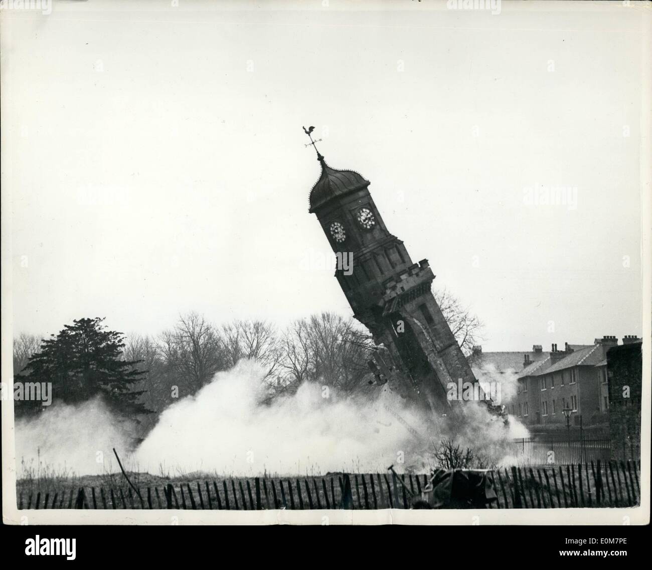 Jan. 01, 1954 - Gelignite Used To Destroy Ancient Steeple In Hamilton - Scotland: About 1,000 people, including many school children watched the destruction of the Old Tolbooth Steeple, in Muir Street, Hamilton, Scotland recently - with the aid of gelignite charges...The steeple bell had tolled out the hours for 312 years but the foundations of the steeple were eaten away and it menaced a nearby housing scheme. Photo Shows: The gelignite charges go off and down topples the ancient steeples. Stock Photo