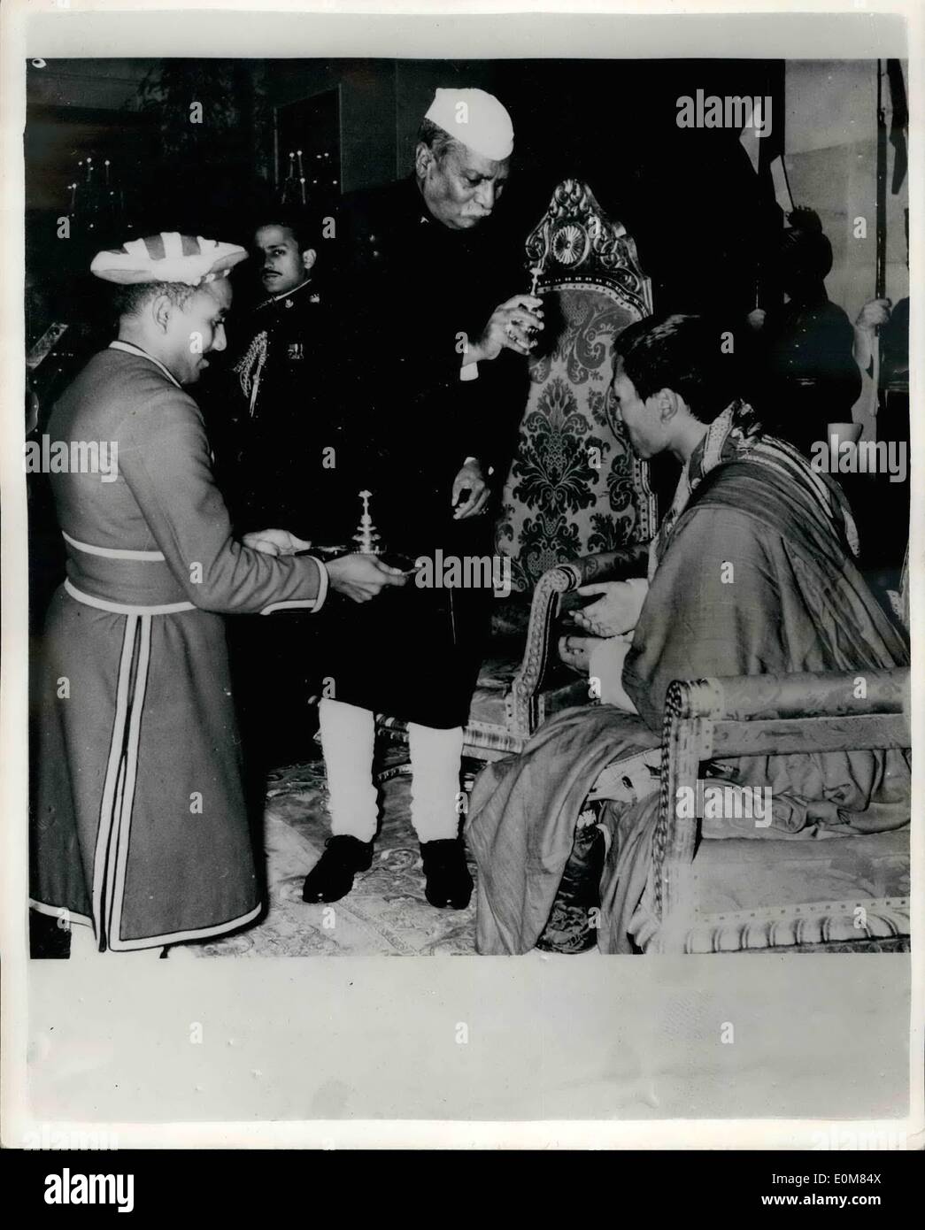 Jan. 16, 1954 - 16-1-54 The President receives his guest. Maharajah presents a shawl. The Maharaja of Bhutan with the Maharani recently paid a State visit to New Delhi where they were received with typical Indian ceremony, the customary presents being exchanged. The President of the Indian Republic, Dr. Rajendra Prasad presented the Maharaja with the traditional Ã¢â‚¬ËœPan' and the Maharaja presented the President with a beautiful shawl. Keystone Photo shows: Dr. Rajendra Prasad the Indian President sprinkles rose water on the Maharajah during the ceremony in New Delhi. Stock Photo