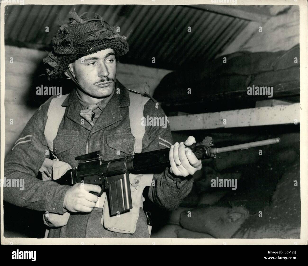Jan. 19, 1954 - New Rifle Demonstrated:A demonstration of Rifle Self Lading F.N. 30-the new rifle developed by the Belgian Company ''Fabrique d'armes de Guerre'' of Liege, was given to ay. It was originally designed to fire the low velocity small calibre. 28 inch ammunition developed in U.K. It has since been modified to fire the high velocity 30 inch universal round, which has been produced to meet the Military Characteristics agreed by the N.A.T.O. countries Stock Photo