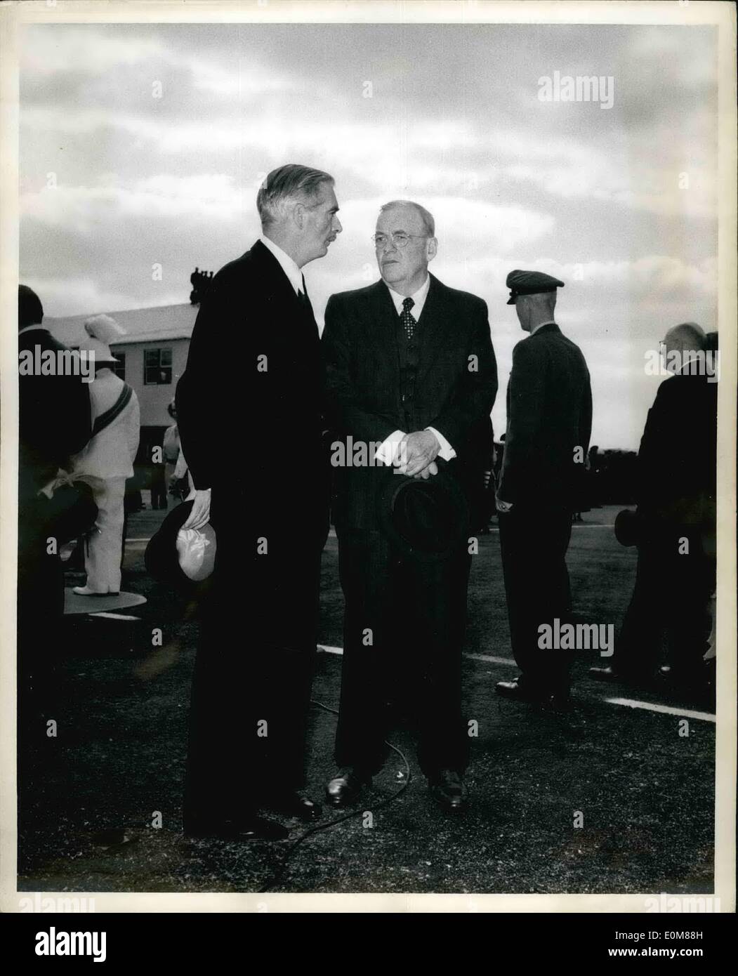 Dec. 12, 1953 - Mr Anthony Eden and Mr John Foster Dulles chat together at Kindley Airfield while President Eisenhower reviews the guard of honor. Stock Photo