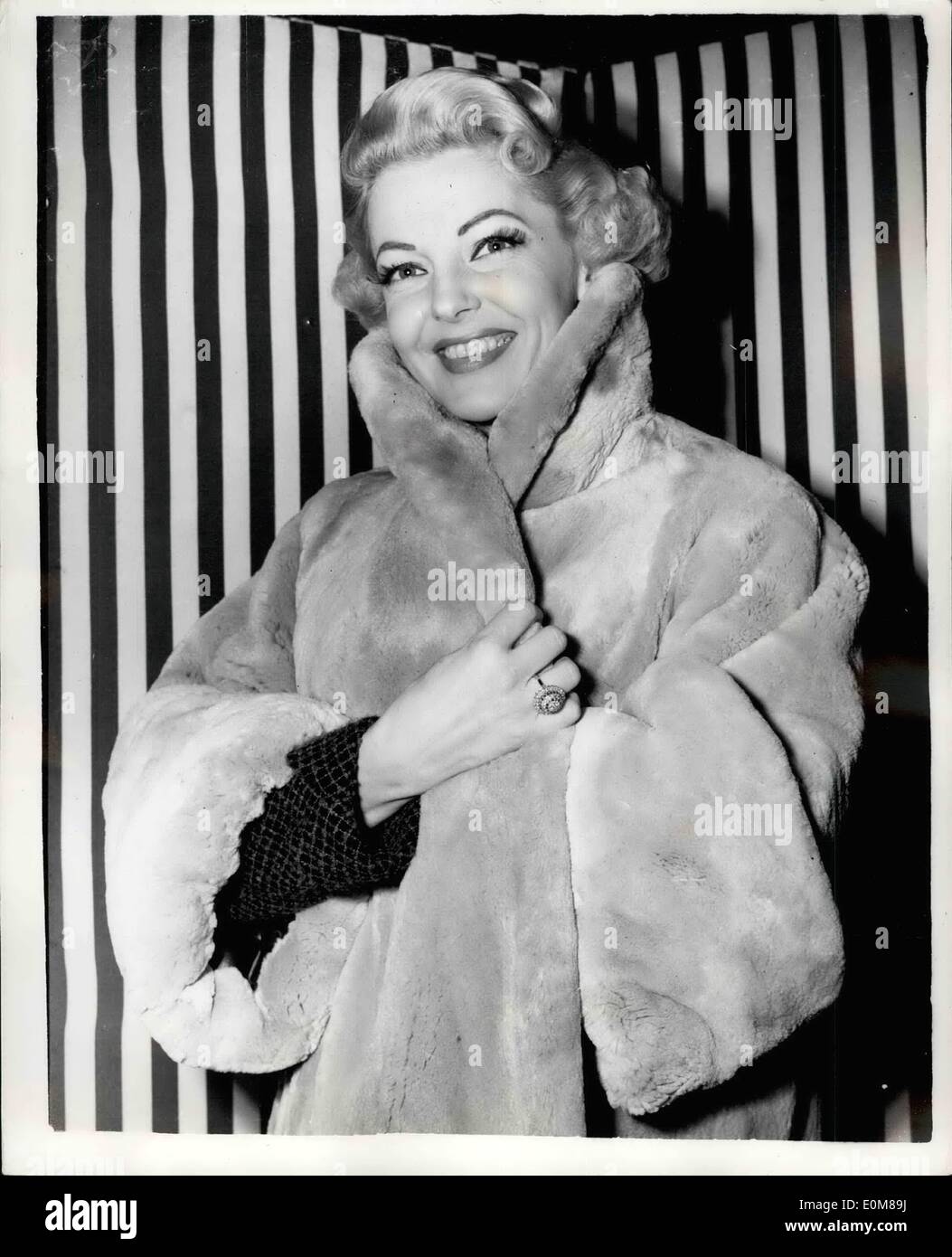 Dec. 12, 1953 - Vivian Blaine's New Year Gift From Husband Is A Blonde Otter Coat: Vivian Blaine, the star of ''Guys and Dolls'' has received a New Year gift from her husband - it is a Blonde Otter coat, claimed to be the only one of its kind in this country, and which is valued at 3000. Photo shows Vivian Blaine wearing her New Year gift Blonde Otter Coat - at the Coliseum this evening. Stock Photo
