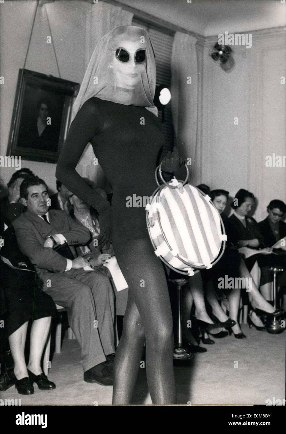 Jan. 28, 1954 - This young girl wearing a black body suit is not trying to imitate a ghost, but presenting a novelty created by Stock Photo