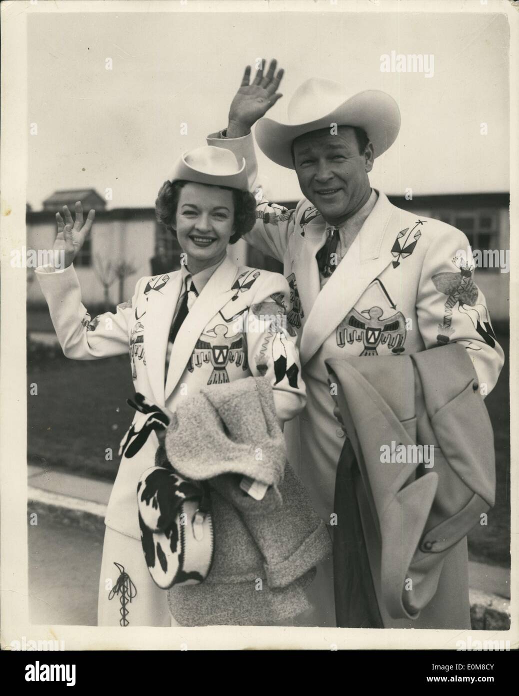 Feb. 02, 1954 - The ''King Of The Cowboys'' And ''Queen Of The West'' Arrive In London: Roy Rogers known as the ''King of the cowboys'' - and his wife Dale Evans - who has been called ''Queen of the West'' arrived at London Airport this morning - for a variety tour which starts in Glasgow on Feb. 15th. Photo shows Roy Rogers and his wife Dale Evans - on their arrival - complete in their 'Wild West' clothes - at London Airport this morning. Stock Photo