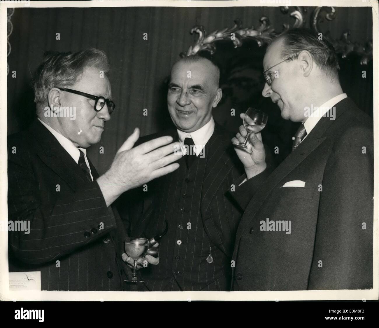 Feb. 02, 1954 - Luncheon To Dr. Zinn: A luncheon was given by the German Charge d'Affaires, at the Dorchester Hotel today, to Dr. Georg Zinn, Speaker of the Upper House of the Bonn Federal Parliament and Prime Minister of the American zone of Hesse, who is in London on a week's visit as guest of the Foreign Office. Photo shows Seen at the Dorchester today are (L to R) : Mr. Herbert Morrison, Herr Dr. Schlange-Schoningen, the German Ambassador, and Dr. Georg Zinn. Stock Photo