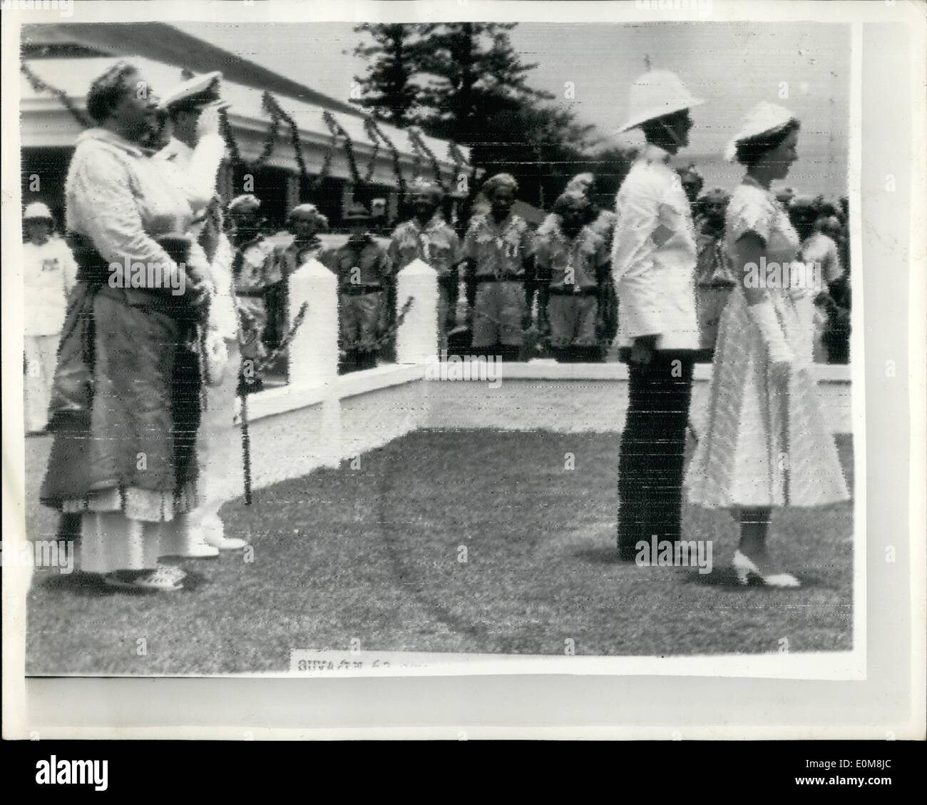 Dec. 12, 1953 - Queen Elizabeth Arrives In Tonga: Queen Elizabeth continuing her Royal Tour arrived in Tonga from Suva, Fiji, it was a day of cheering, dancing and feasting. Tonga's great welcome started with two of the World's reigning Queen's sharing a joke that began on Coronation Bay. As the Queen and the towering Queen Salote drove off From the fastooned wharf a cloud sent down a ''Token'' shower, a gentle reminder of Coronation Day Stock Photo