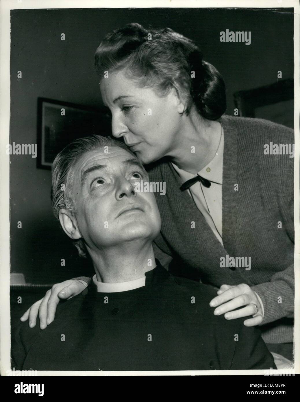 Feb. 02, 1954 - Robert Donat Returns to the screeen. A welcome kiss for the Parson: Robert Donat who was lasts seen in films as Stock Photo