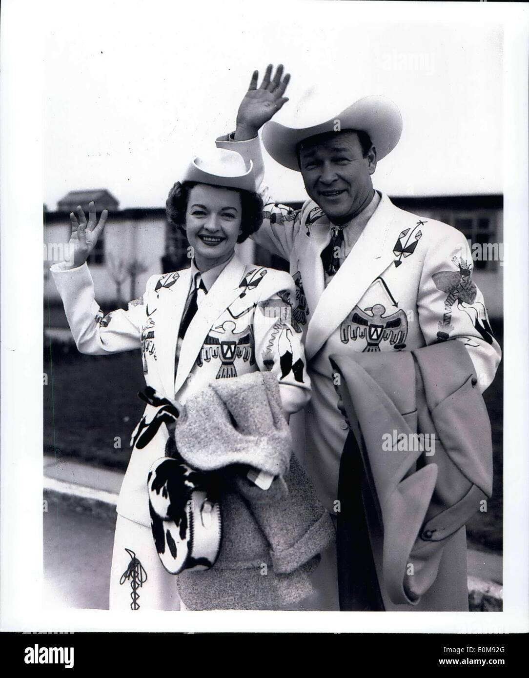 Feb. 10, 1954 - The King of the cowboys'' - and ''Queen of the West'' arrive in London.. Roy Rogers known as the ''King of the Cowboys'' - and his wife Dale Evans - who has been called ''Queen of the West'' arrived at London Airport this morning - for a Variety tour which starts in Glasgow on Feb, 15th. Photo shows Roy Rogers and his wife Dale Evans - on their arrival - complete in their 'wild west' clothes - at London Airport this morning. Stock Photo