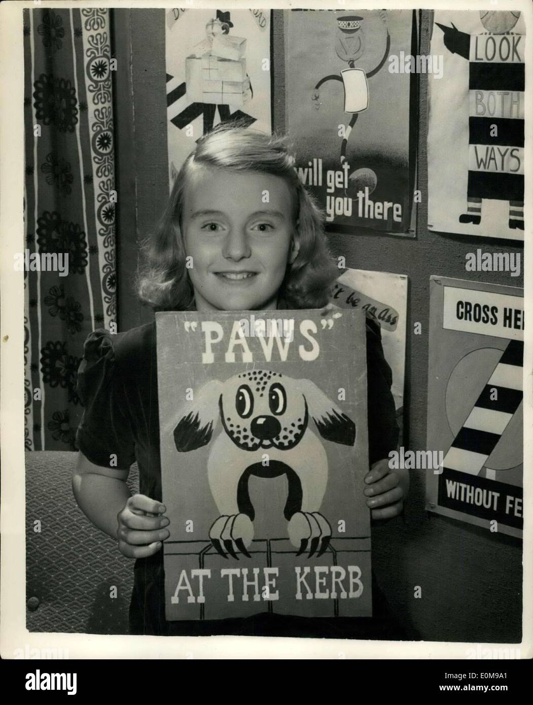 Feb. 22, 1954 - Rosemary Wins B.B.C. Road Safety Poster Contest, Shown on T.V. Keystone Photo Shows: Twelve year old Rosemary Rennie seen with her Road Safety Poster ''Paws on the Kerb'' with which she won the B.B.C Televison contest yesterday. Expert poster expists claimed that it was one of the best posters they had seen on the subject. Rosemary used a China dog as her model, and the wall of a pigsty on her mother;s farm near Glasgow as an easel. Stock Photo