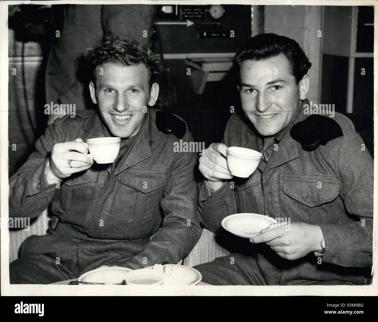 Mar. 03, 1954 - Survivors Of The ''Empire Windrush'' Disaster Arrive. A Cup Of Tea - At Blackbushe. Photo shows Two boys with a Stock Photo