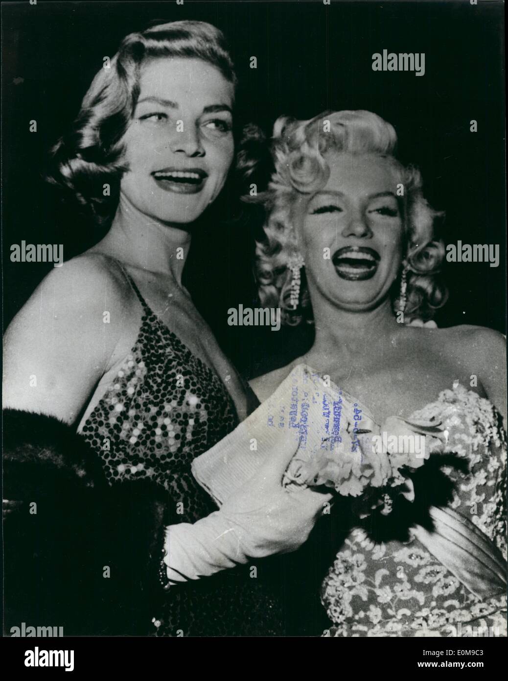 Mar. 03, 1954 - Smiling stars: Beautiful Marilyn Monroe (right) and her equally famous film star friend, Lauren Bacall, were in Stock Photo