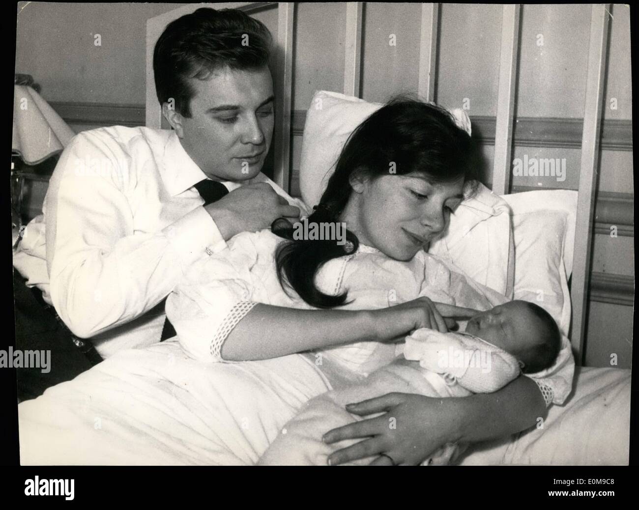 Mar. 03, 1954 - JULIETTE GRECO HAS A DAUGHTER. FAMOUS FRENCH SCREEN STAR (AND FORMERLY SAINT-GERMAIN DESPRES SINGER) JULIETTE GRECO IS THE HAPPY MOTHER OF THE SIX-DAY-OLD BABY DAUGHTER LAUNRENCE-MARIE. THE FATHER, SCREEN AND STAGE ACTOR PHILIPPE LEMAIRE, LOOKS ON TENDERLY. Stock Photo