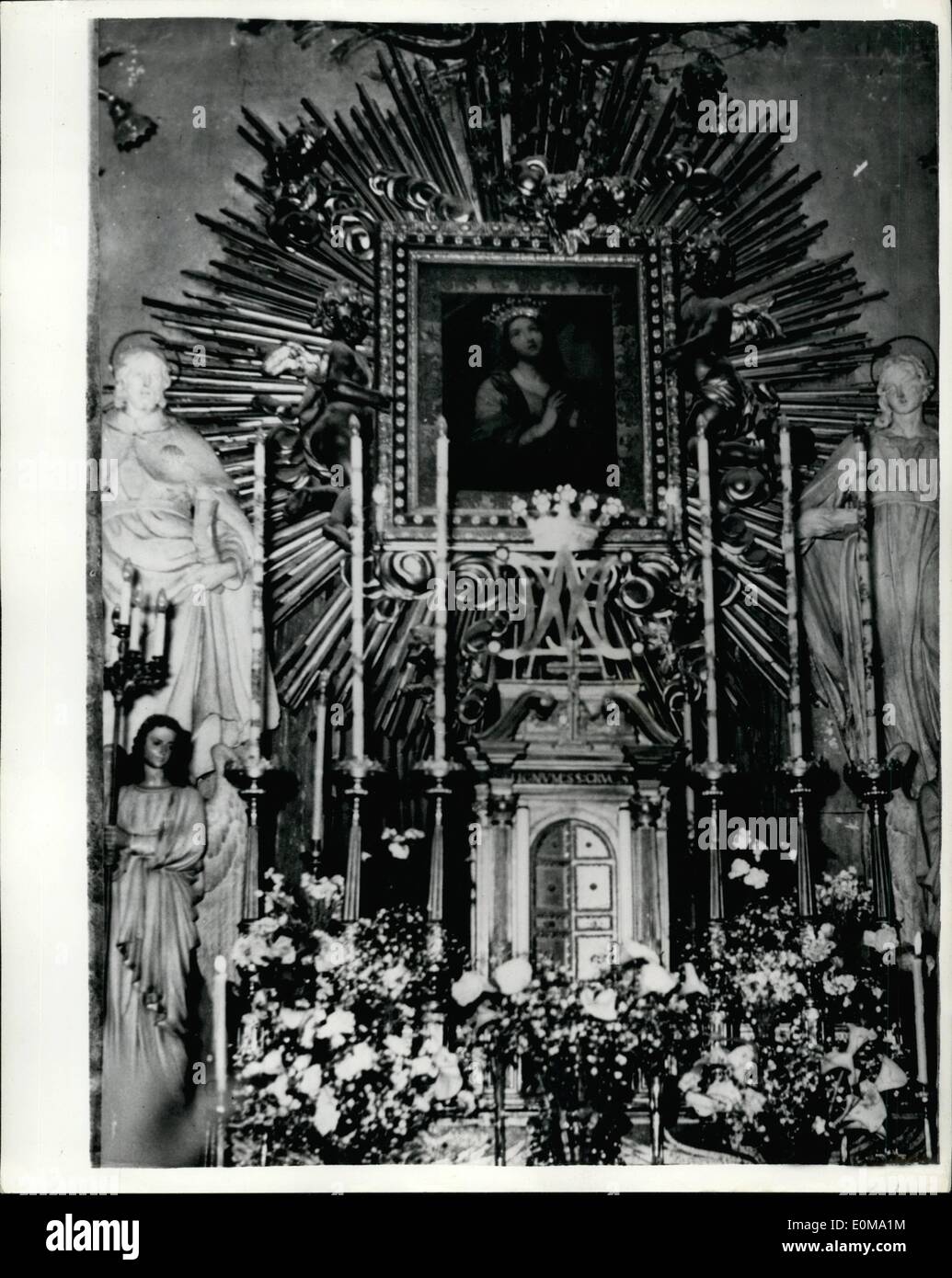 May 05, 1954 - Another ''Miracle'' Claimed In Italy. Eyes Of A Portrait Said To Have Moved. Photo Shows:- The heavily edecked portrait of the Virgin Mary - at Vicovaro, Italy - which some Catholic Faithfuls have claimed to have seen the eyes actually move. The town of Vicovaro is 50 km from Rome. Stock Photo
