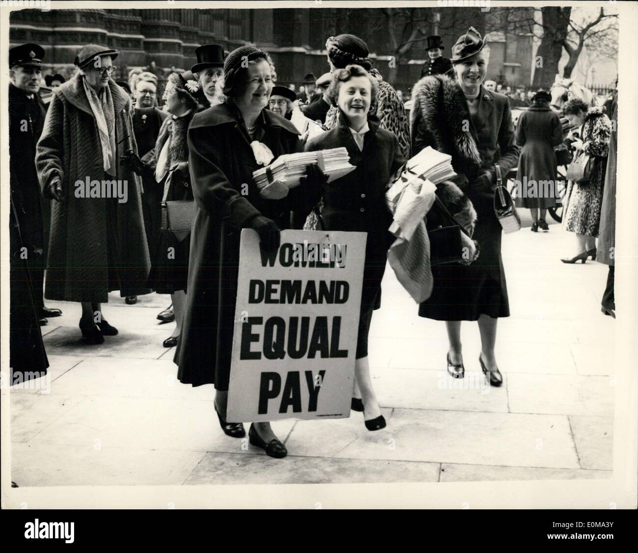 Mar. 08, 1954 - Equal Pay Campaign Committee Visits House Of Commons.: Membera of the Equal Pay Campaign Committee visited the House of Commons this afternoon with a petition signed by eighty thousand. They travelled in horse drawn carriages - including the one that Queen Salote used at the Coronation. Photo shows Arriving with the Petition this afternoon are L-R:- Miss Irene Ward (M.P. Tynemouth); Mrs. Barbara Catle M.P. Blackburn; Mrs. Patricia Ford M.P. Co. Down. N. Ireland (looking back) and Dr. Edith Summerskill M.P. Fulham. Stock Photo