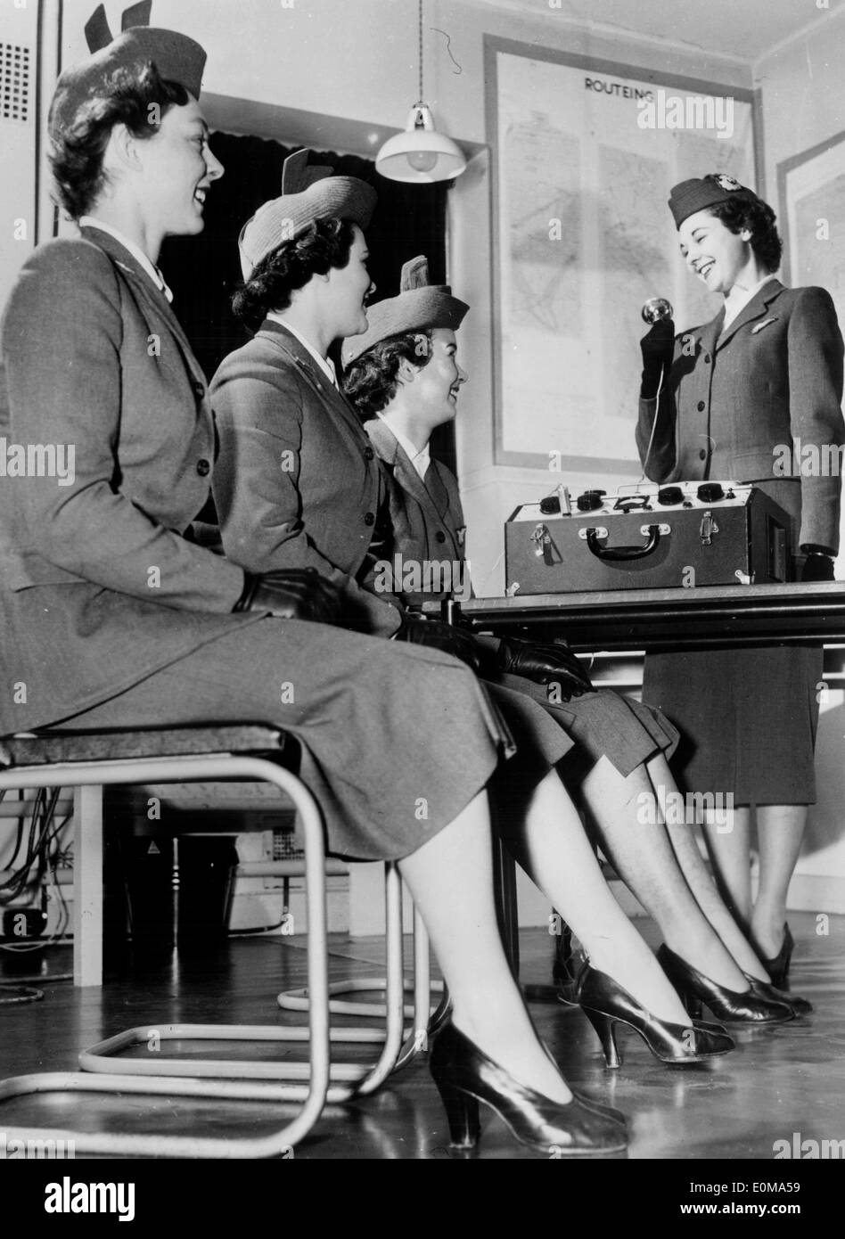 Mar 15, 1954; London, UK; As planes get faster British European Airways is finding air hostesses have less time on their trips Stock Photo