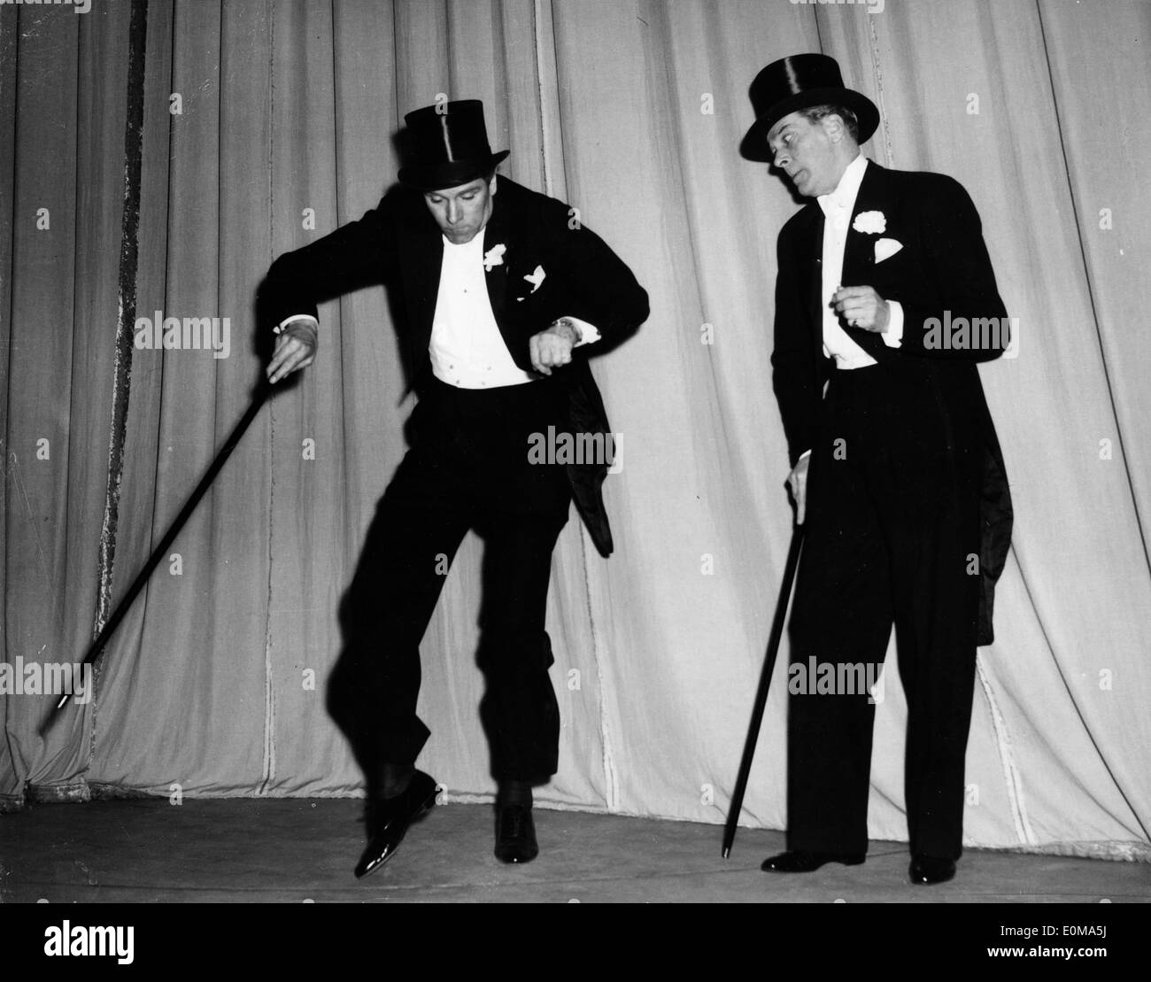 Actor Laurence Olivier and Jack Buchanan rehearse for a show Stock Photo