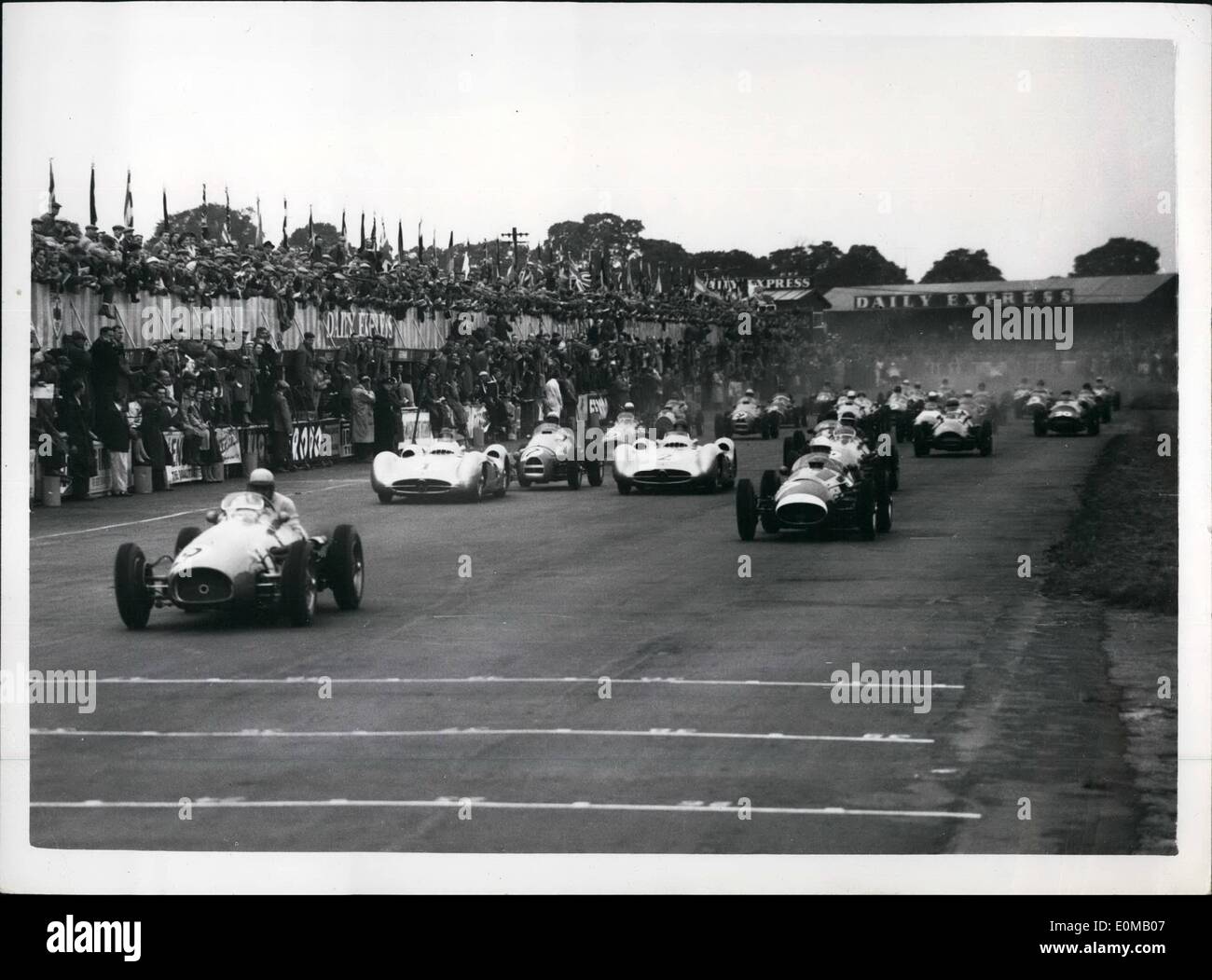 Jul. 07, 1954 - GONZALEZ WINS THE BRITISH GRAND PRIX AT SILVERSTONE.. MIKE HAWTHORN COMES SECOND.. Gonzales the Argentine champion driving an Italian Ferrari - won the British Grand Prix at Silverstone this afternoon after a great tussle with Mike Hawthorn of British who was also driving a Ferrari - and who came in second place. O. Marimon driving a Maseratti came third and J.M. Fangio (Mercedes Benz) took fourth place.. Keystone Photo Shows:- General view of the start of the British Grand Prix at Silverstone this afternoon. Stock Photo