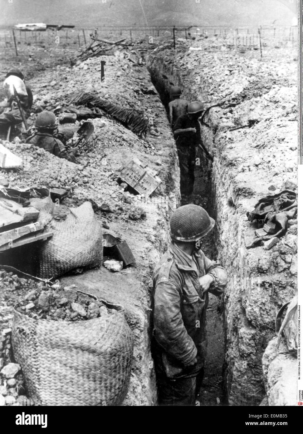 A soldier in a trench during battle at Dien Bien Phu Stock Photo