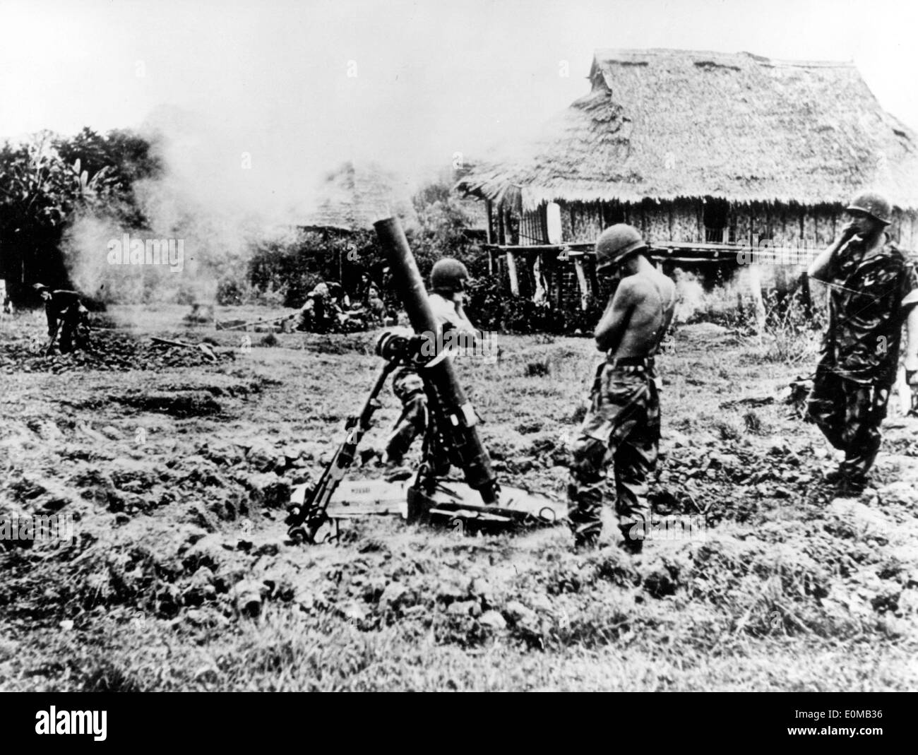French soldiers shoot off a grenade launcher at Dien Bien Phu Stock Photo