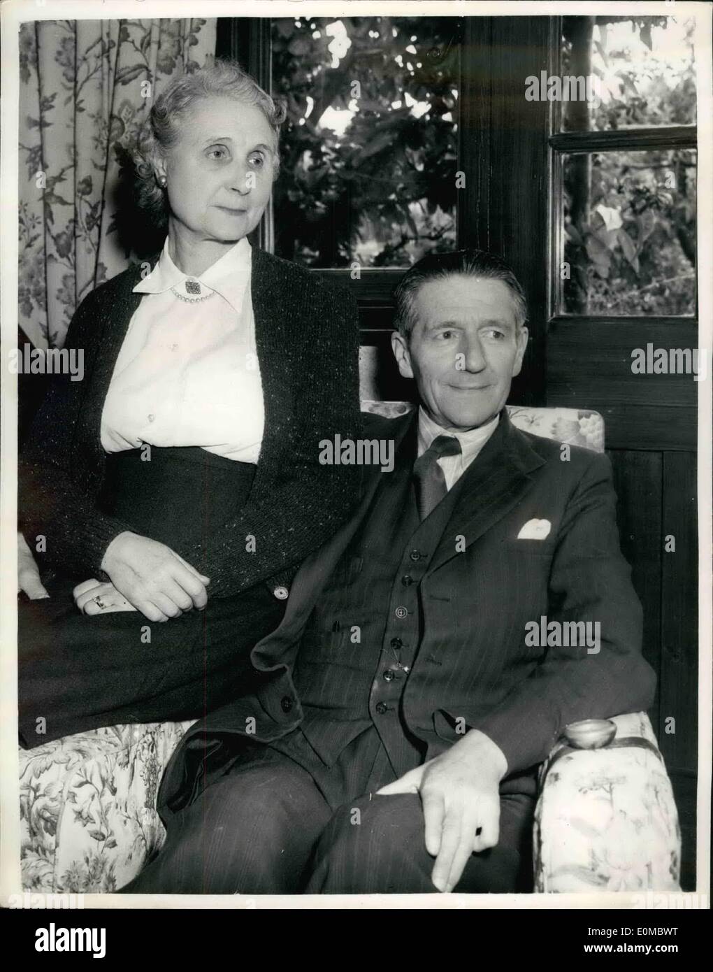 Aug. 08, 1954 - Baronet runs Deal toyshop. Photo shows Photographed with his wife at Deal yesterday - Sir Alexander King, who runs a toyshop in Deal has succeeded to the title following the death of his uncle, Sir George King, in South Africa. Stock Photo