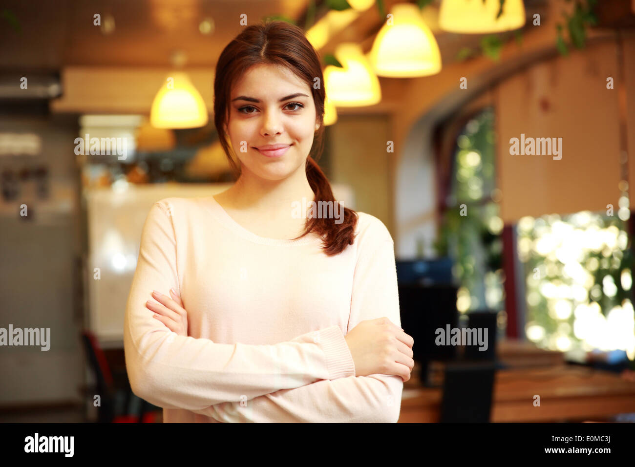 Young woman arms folded model hi-res stock photography and images - Alamy