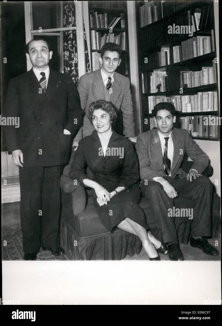 Jun. 15, 1954 - Meet new Premier's family - M. Mendes France who has the uneasy task of forming the new French government photographed with his wife and two sons in his library, in Paris, last night. Stock Photo