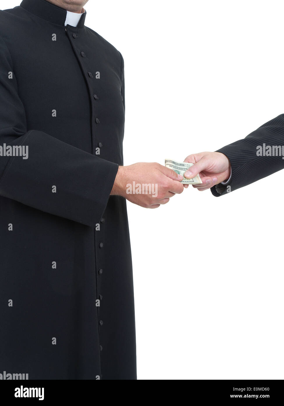 Catholic priest receiving bribe from businessman Stock Photo