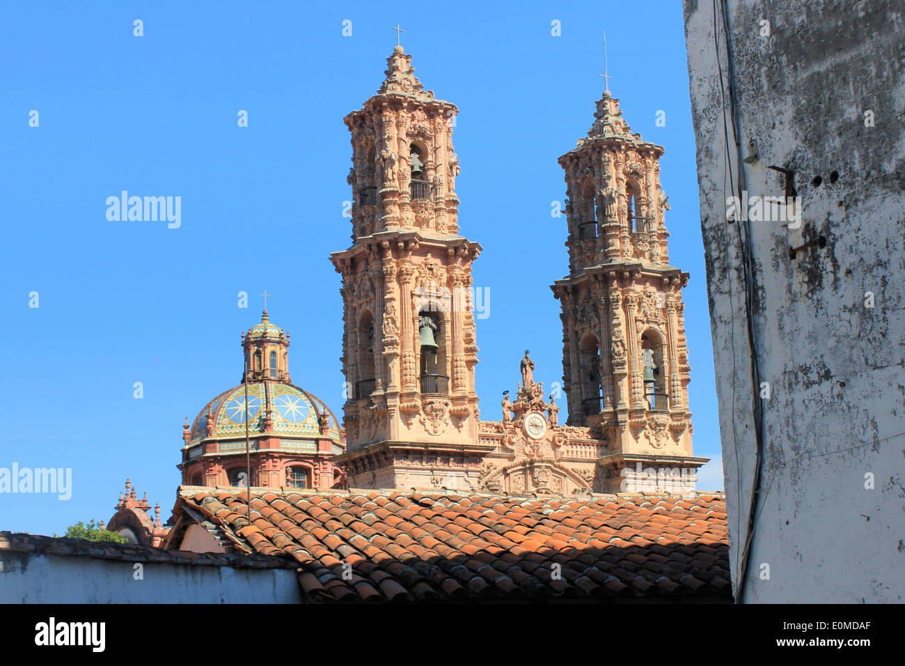 The bell-towers and dome of the Church of Santa Prisca in Taxco ...