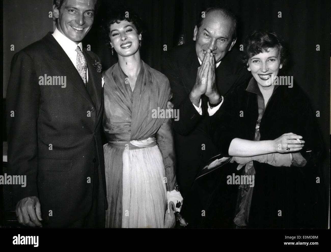 Oct. 10, 1954 - Finish the Conference........called stage manager William Dieterle at a press conference yesterday. He introduced the leading performers of his Richard-Wagner-film named ''Feuerzauber''. Photo Shows (left to right) Carlos Thompson, Rita Gam, William Dieterl, and Valentina dortese. Stock Photo