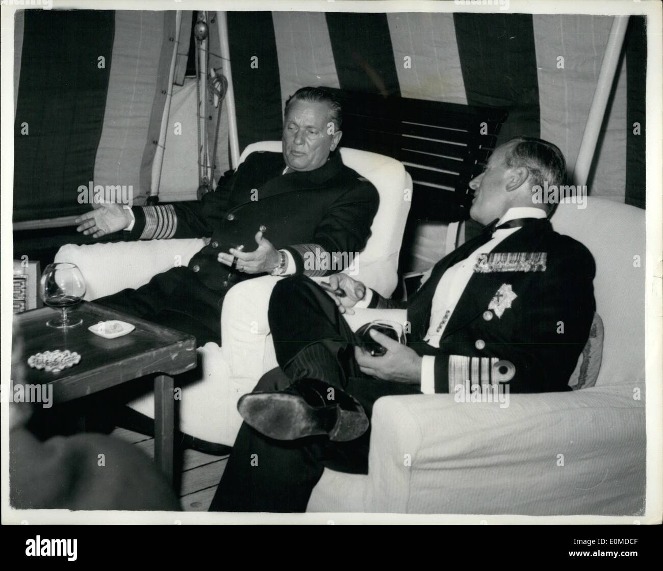 Oct. 10, 1954 - Admiral Mountbatten says farewell to president Tito: Admiral the earl Mounbatten of Buran, K.G., K.C.B., G.C.V.O., G.M.S.I., D.S.O, flying his flag in the dispaton vessel Surprise, arrived off the island of Brioni, Yugaslavia, recently. After firing a personal salute to president Tito on the North Side of the Island in sight of the President's House , H.M.S. surprise are horde off the harbor on the South side of the island. Admiral Mountbatten was paying a farewell call on president Tito before relinguishing his command of the Mediterranean Flest later this year Stock Photo