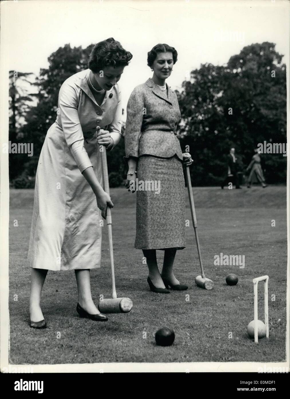 Sep. 09, 1954 - The Duchess Of Kent And Princess Alexandra Playing Croquet. H.R.H. The Duchess Of Kent and her daughter Princess Alexandra were to be seen this morning at their home Coppins, Iver Bucks. Photo Shows The Duchess Of Kent and  Princess Alexandra have a game of croquet on tie lawn at Coppins this morning. Stock Photo