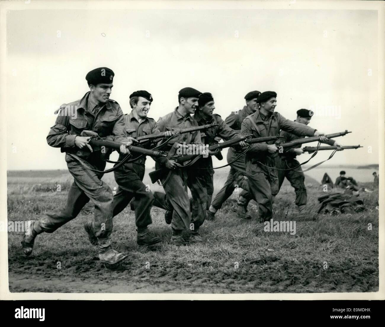 Sep. 09, 1954 - Exercise ''London Pride'' On Salisbury Plain. Fusiliers Make An 'Attack': Some 12,000 men and 4,000 vehicles are of the 56th. (London) Armoured Division (T.A.) is carrying out exercise ''London Pride'' on Salisbury Plain, The exercise is designed to practice the Division in carrying out an approach march followed by an opposed crossing of the River Avon and a break out from a bridgehead-against an enemy known to be equipped with atom bombs Stock Photo