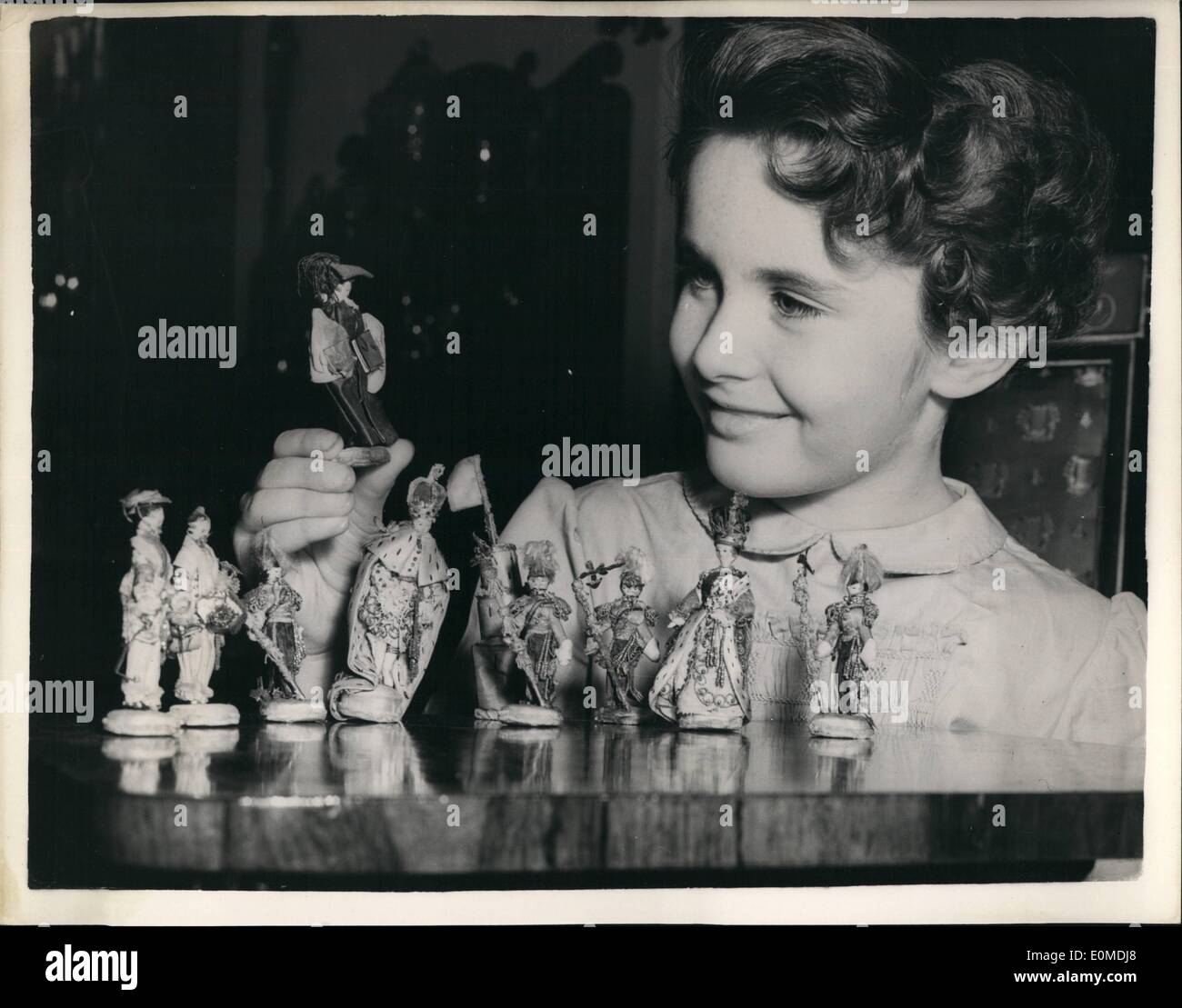 Sep. 14, 1954 - Autumn antique Dealer's Fair at Chelsea Town Hall. Needlework Chess Set. Press preview was held this afternoon at Chelsea Town Hall of the Autumn Antique Dealer's Fair. Keystone Photo Shows: Penny Makins of London seen with a unique set of Needlework Chessmen made in silk beads, and gold and silver thread, some pieces started in 1740 and the latest was made in the time of the Chinese rebellion. Stock Photo