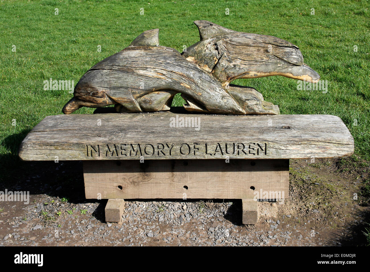 Dolphin Memorial Wooden Bench 'In Memory Of Lauren' Stock Photo