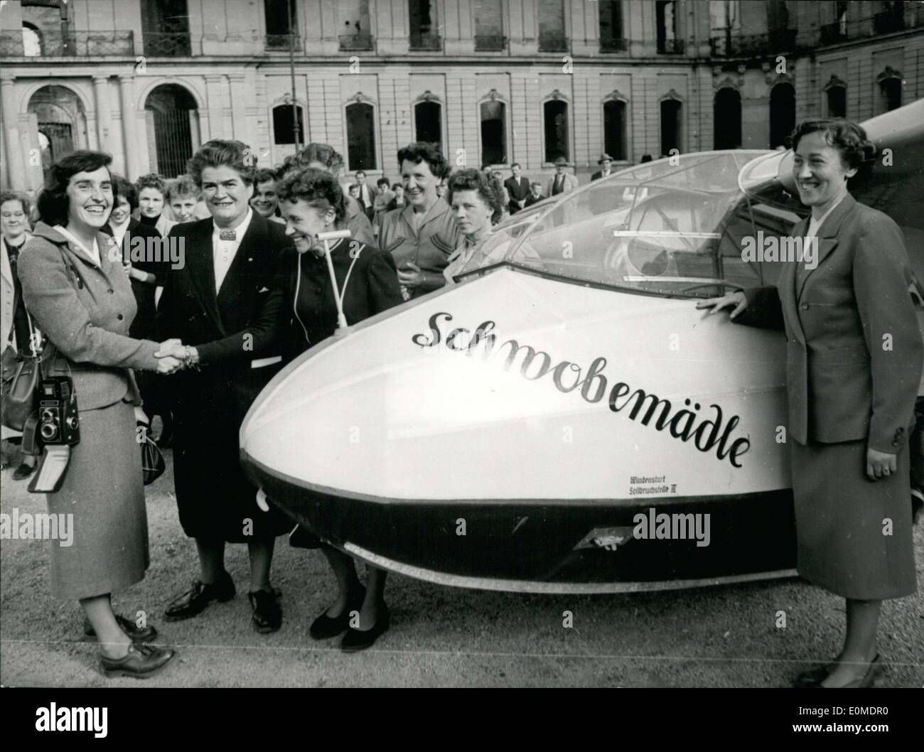 Oct. 25, 1954 - Pictured is the ''Schwobemaedle,'' the first machine of the Stuttgart Glider Pilot Club, which celebrated its 10th anniversary. Pictured on the right is Hanna Reitsch and on the left is American Betsy Woodwords, who held the record for glider pilots. Stock Photo