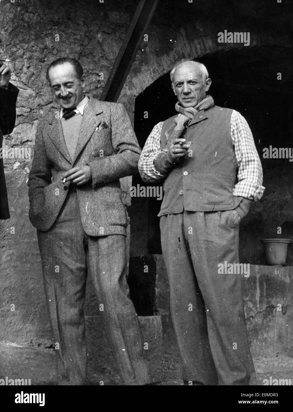Artist Pablo Picasso with M. Ramier in the entryway of The Pottery of Vallauris Stock Photo