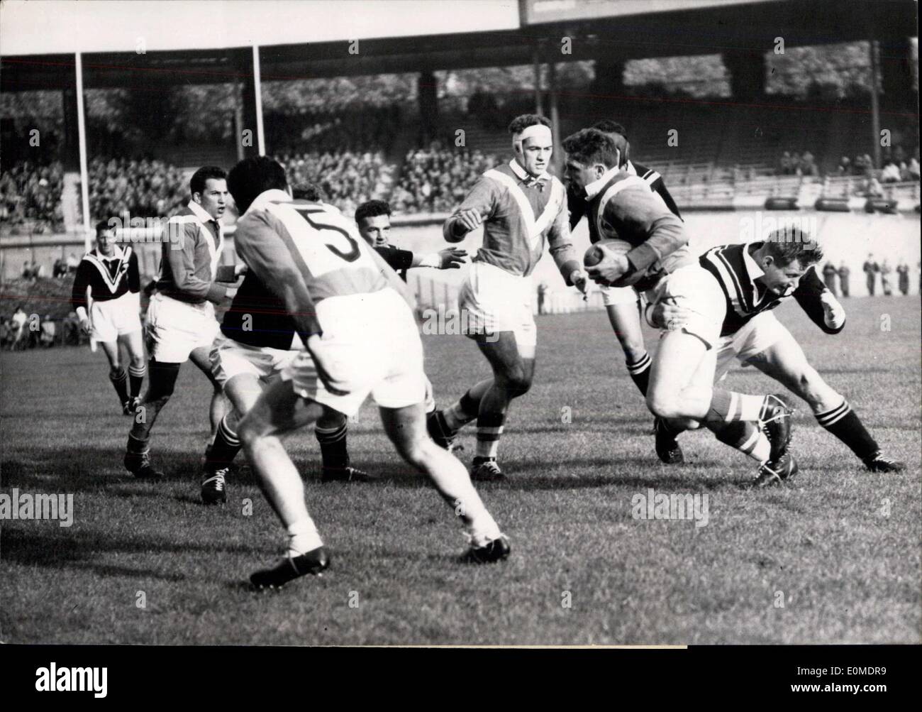 Oct. 30, 1954 - Jimenez, who has the ball, throws himself to the ground, under the watchful eyes of Krawzyk, who is waiting for Stock Photo