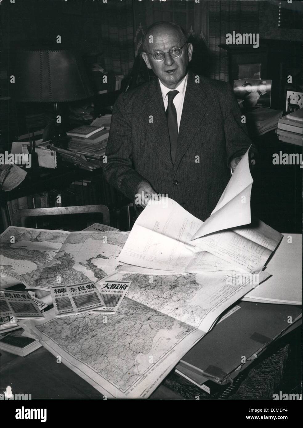 Jan. 01, 1955 - A new atlas: The Munich University professor Dr. Friedrich Burgdofer made a new atlas which shows the distribution of all the people over all the world very detailed. The Atlas is written in German and English language. Photo shows Dr. Burgdorfer during his work. Stock Photo