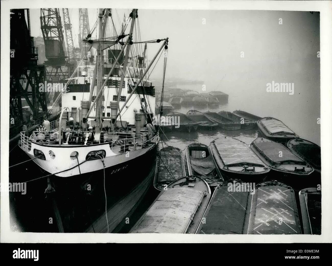 Nov. 11, 1954 - The Dock Strike Threatens To Spread. Idle Shipping In The Pool Of London: Many crowds of idle dockers - and dozens of idle ships were to be seen in the Tooley Street, Bermondsey - wharf area this morning - following the strike of 2,500 dockers who refused to work on lorries driven by non-Union men - or those who worked during the big October Strike. Many efforts are being made to get them to return to work. Photo shows The scene in the Pool of London this morning from Tower Bridge showing the idle shipping. Stock Photo