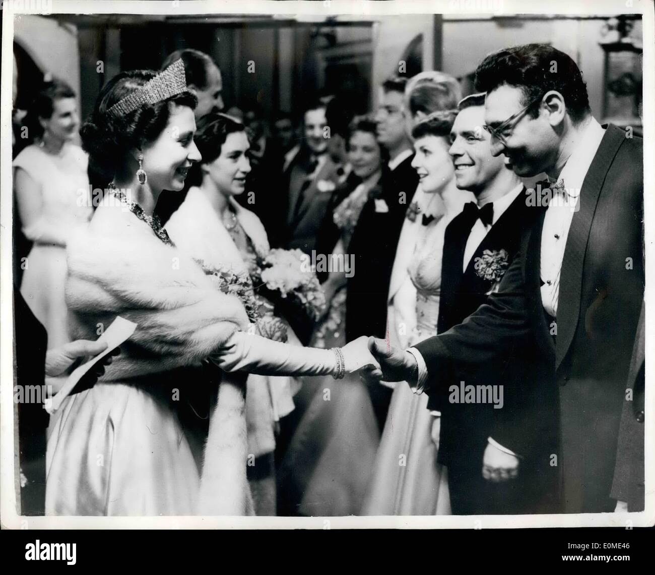Nov. 11, 1954 - Royal variety performance at London Palladium. Queen with Frankie Laine. Photo shows Queen shakes hands with Frankie Laine - next to whim is Norman Wisdom.. Princess Margaret looks on- at the Palladium. Stock Photo