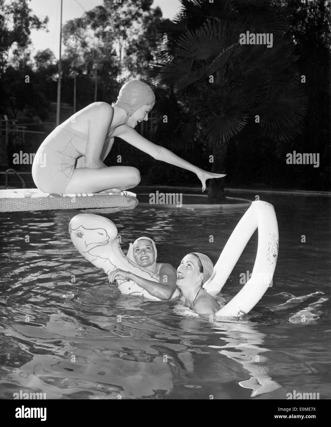 Actresses Jane Russell, Faith Domergue and Jane Greer swimming Stock Photo
